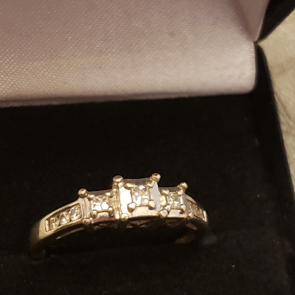 14 k gold, 9 diamond ring.
